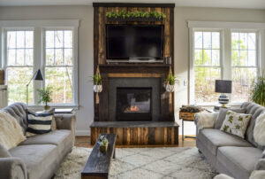 Before photo of the fireplace in wood with white walls.