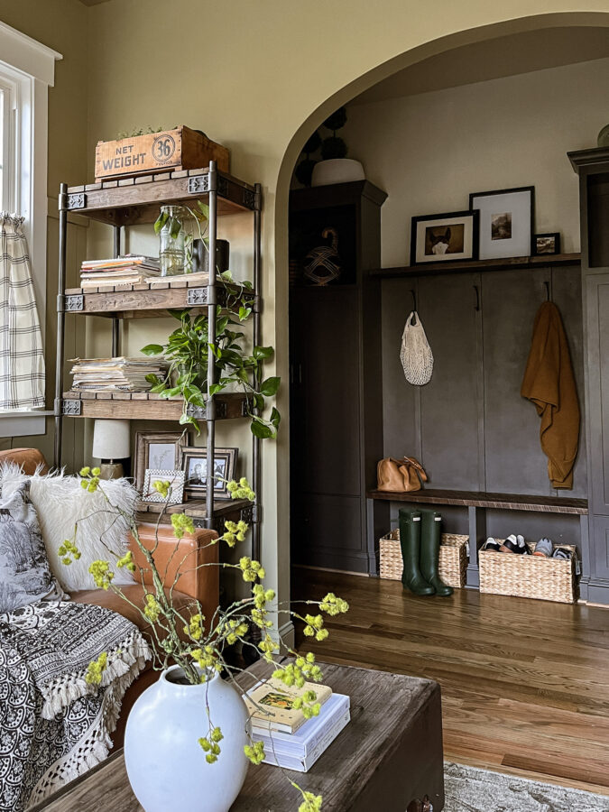 mudroom view with urbane bronze walls and cabinets, industrial shelving from Pottery Barn