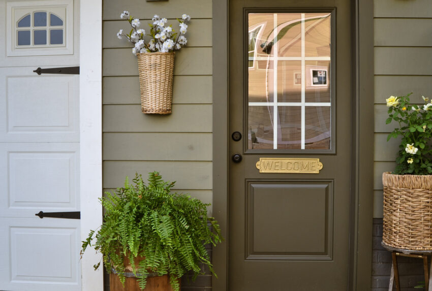 Side entry door painted in Tavern Charcoal by Ben Moore